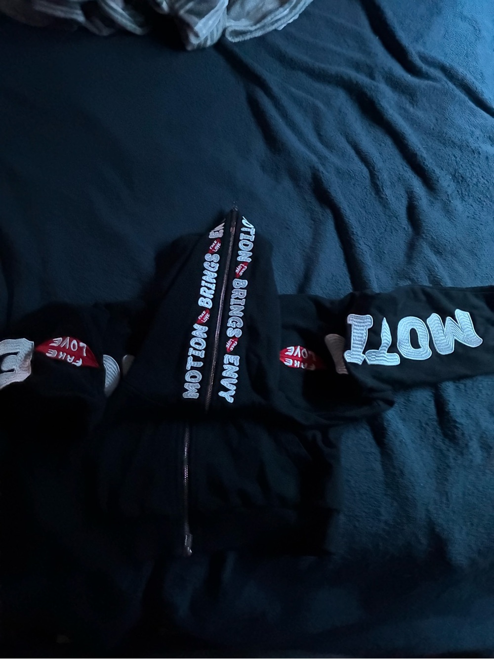 Black Graphic Zip-Up Hoodie with 'MOTlow' Text
